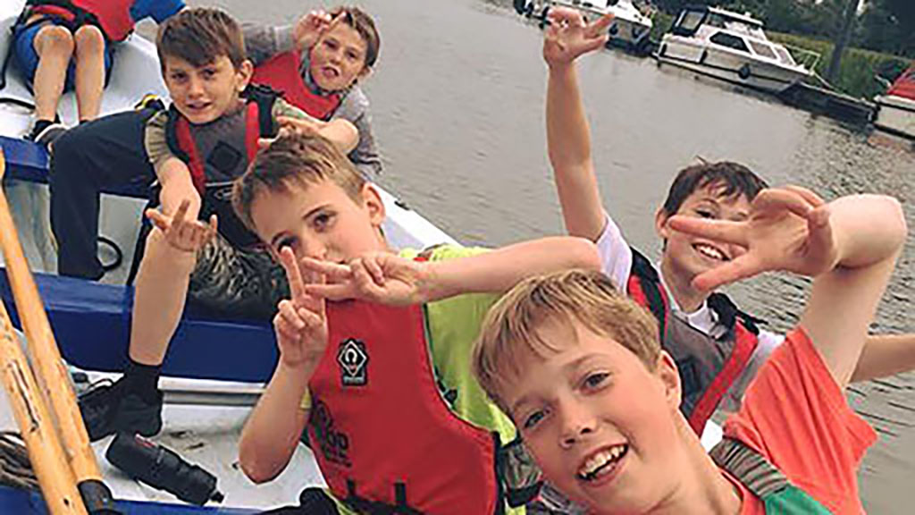 Sea Cadets rowing in a Trinity 500