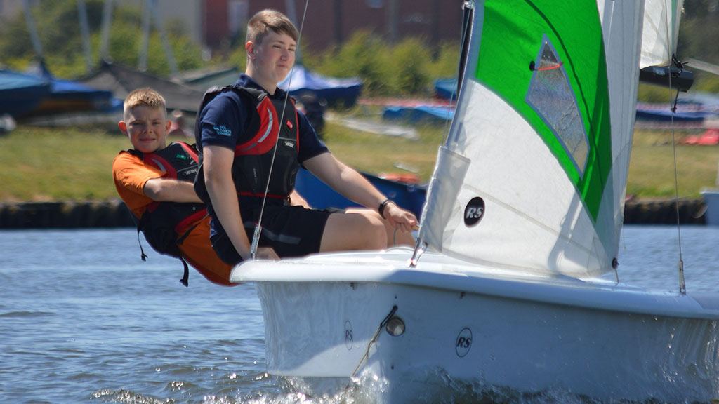 Two cadets sailing a Quest